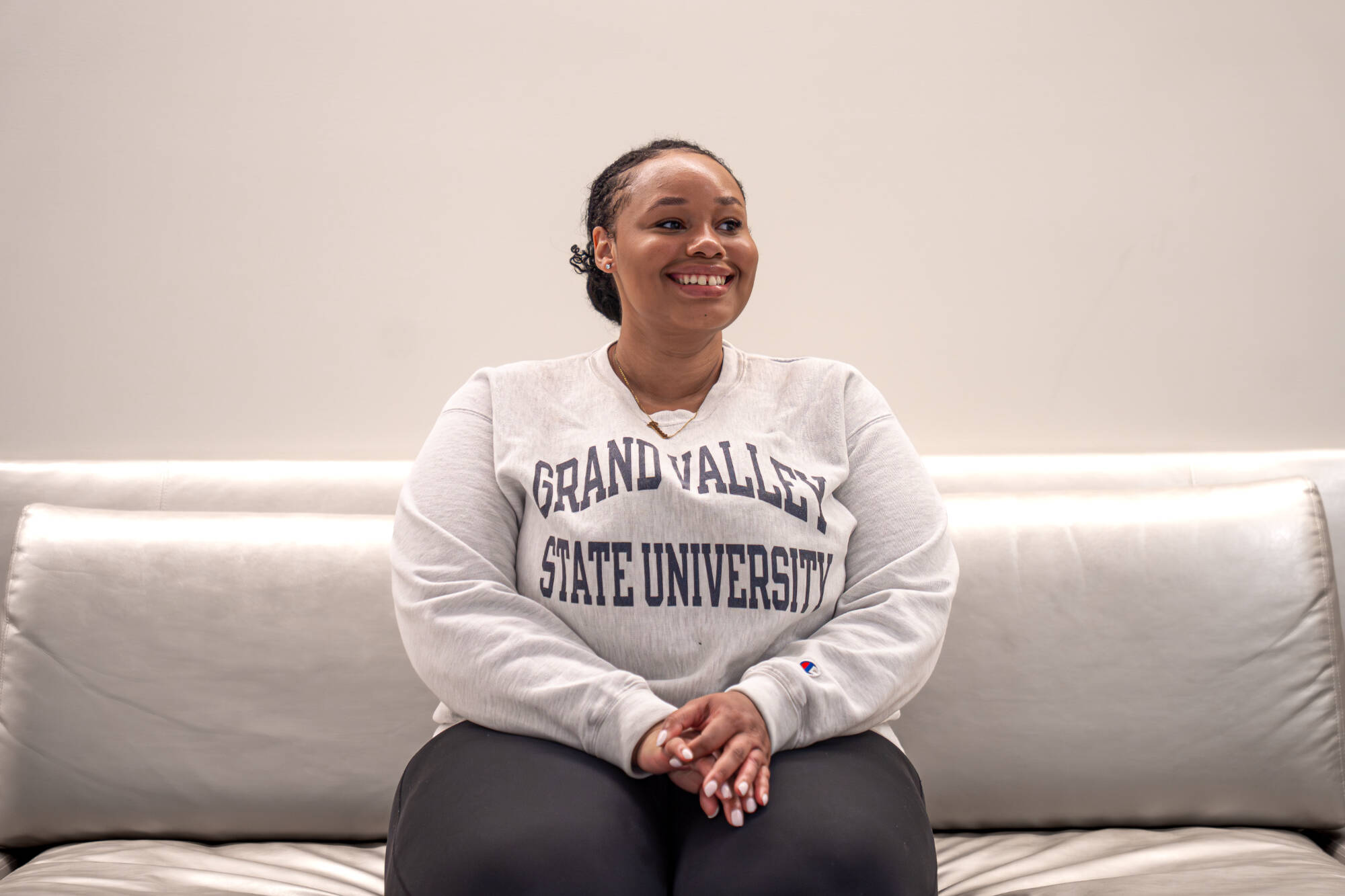 Environmental portrait of Genesis, student at Grand Valley State University, captured in the Zumberge building on September 9th, 2025